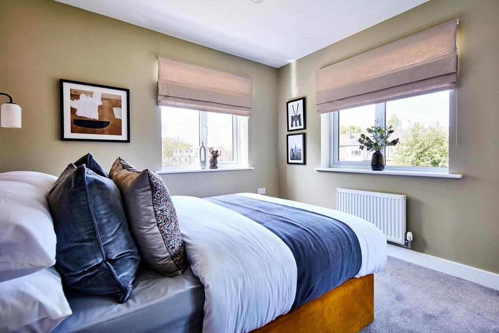 With 2 windows, the 2nd bedroom is light and airy
