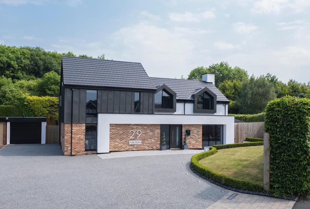 An individually designed, extended and fully renovated detached family