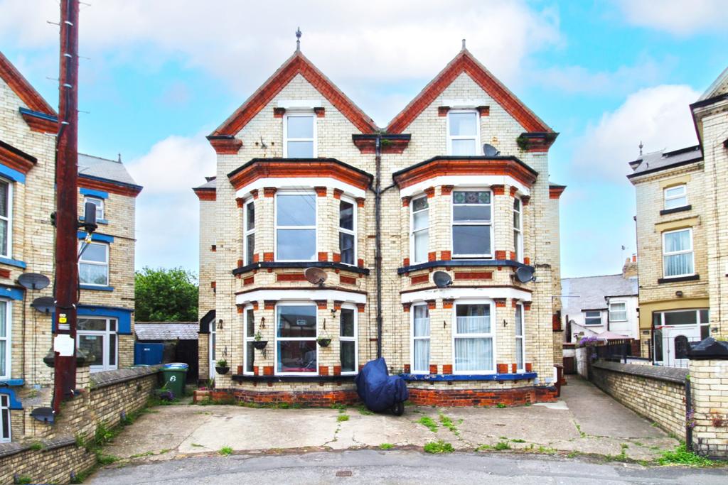 3 flats in a semi detached house   for sale by au