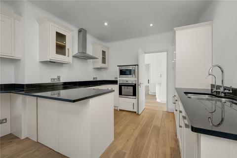 1 The Gardens, Esher, KT10 8QF