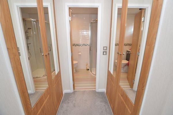 Wardrobe area to en-suite