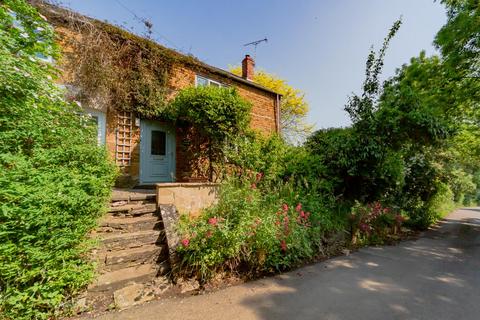 Spring Cottage, 15 Glaston Road, Bisbrooke, Oakham, LE15 9EN
