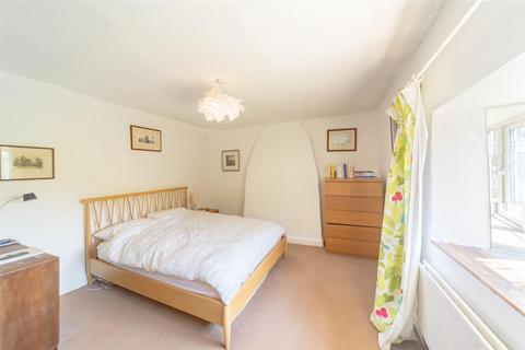 Spring Cottage, 15 Glaston Road, Bisbrooke, Oakham, LE15 9EN
