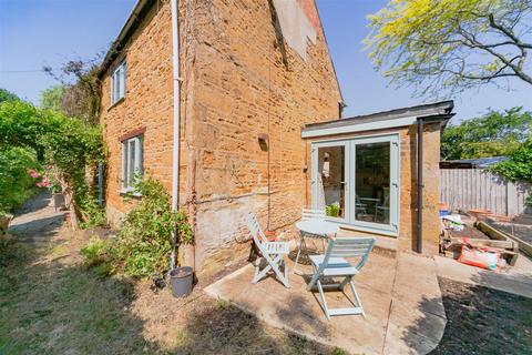Spring Cottage, 15 Glaston Road, Bisbrooke, Oakham, LE15 9EN