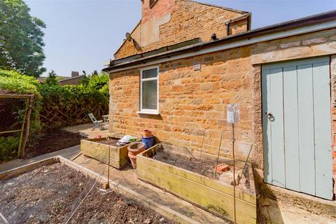 Spring Cottage, 15 Glaston Road, Bisbrooke, Oakham, LE15 9EN