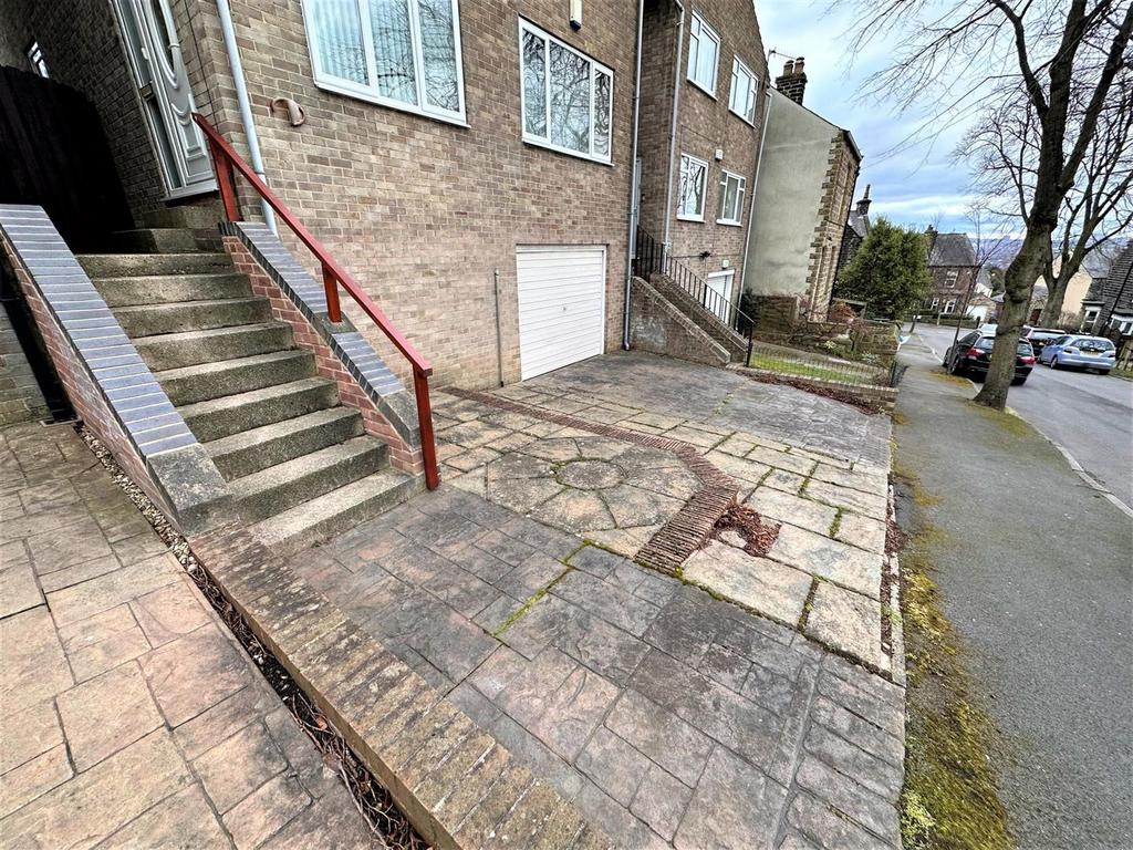 Drive and steps to entrance door
