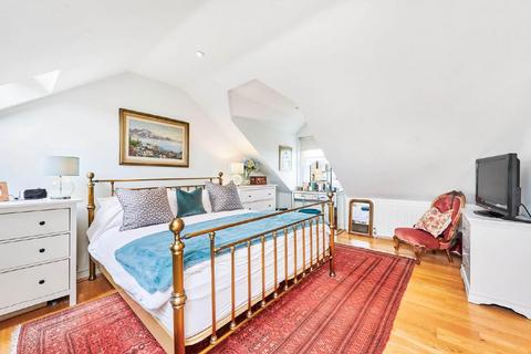 15 Dunmore Road, London, SW20 8TN