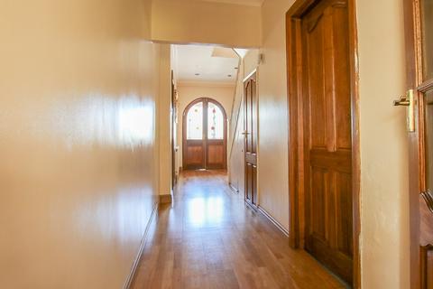 25 Raleigh Avenue, Wallington, SM6 8HE