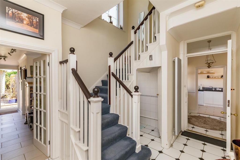 Stairs rising to First Floor
