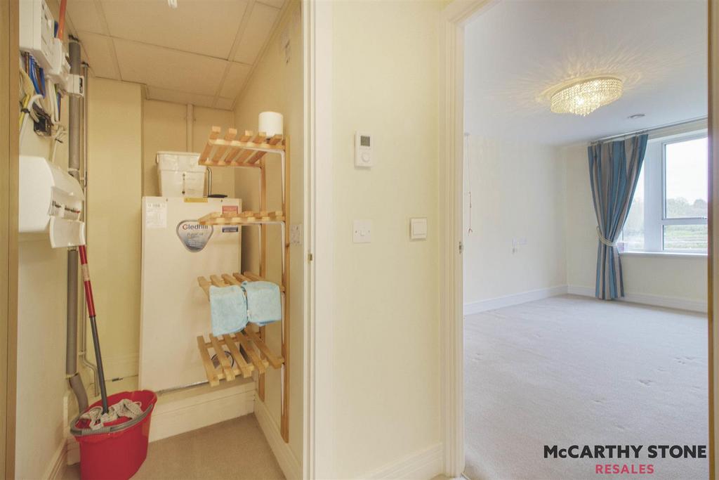 04 hallway storage and bedroom.jpg