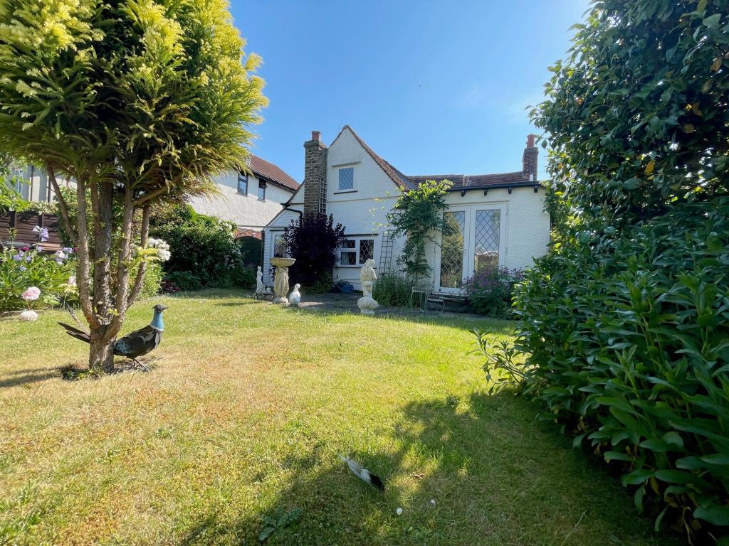 Rear elevation and garden at Rose Cottage