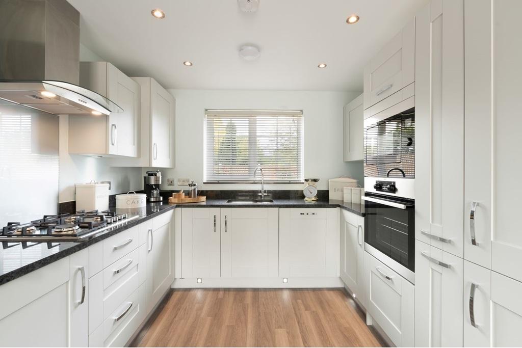 A Taylor Wimpey kitchen makes meal preparation...