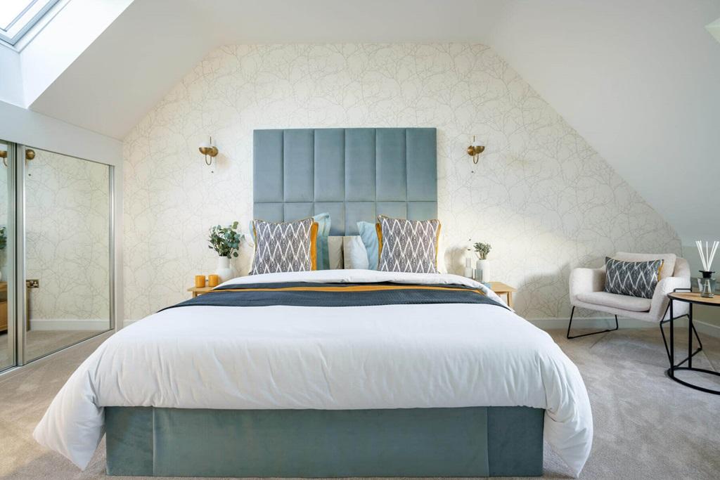 The main bedroom occupies the entire second...