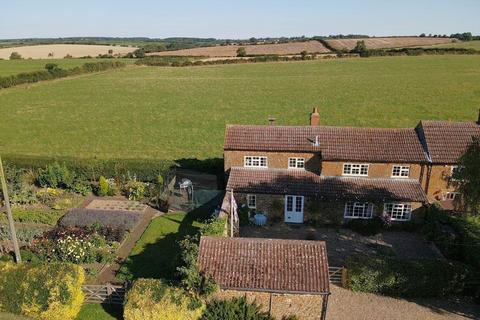 3 bedroom cottage for sale, Delightful three bed cottage in conservation village. Panoramic views of open countryside.