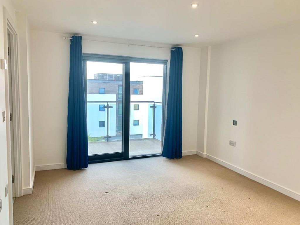 Bedroom 1 with Balcony.jpg