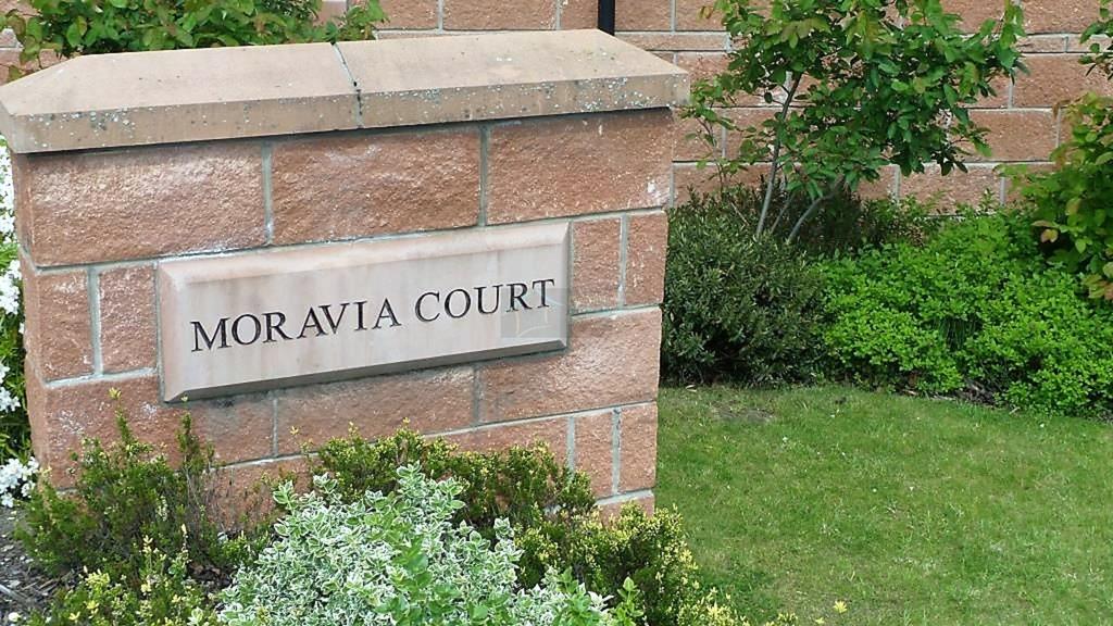 Moravia Court Logo
