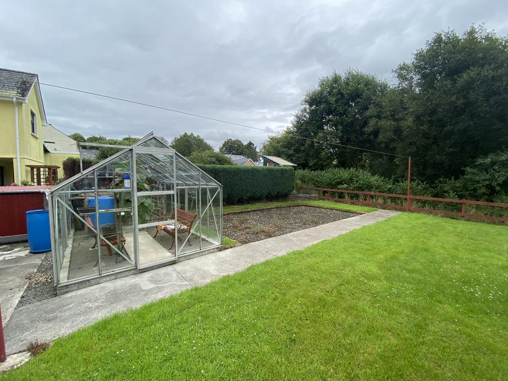 Greenhouse and former vegetable garden