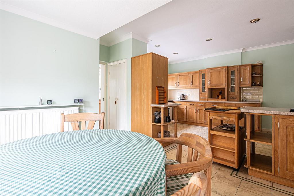 Breakfast area through to kitchen