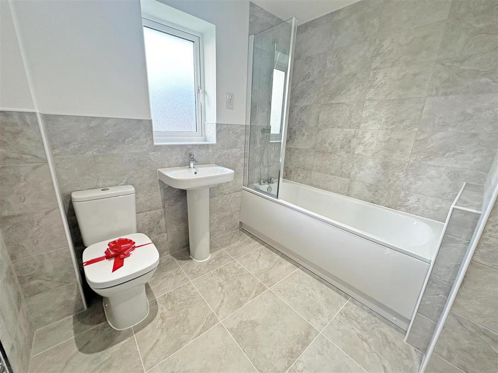 Fully Tiled Bathroom