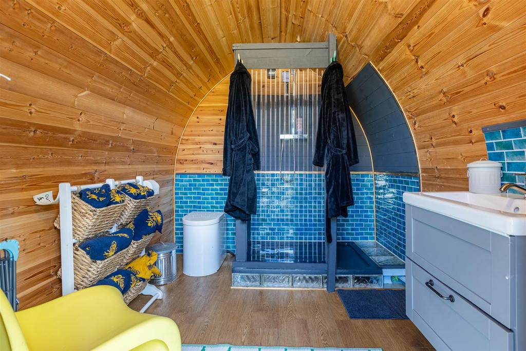 Compostable toilet and shower