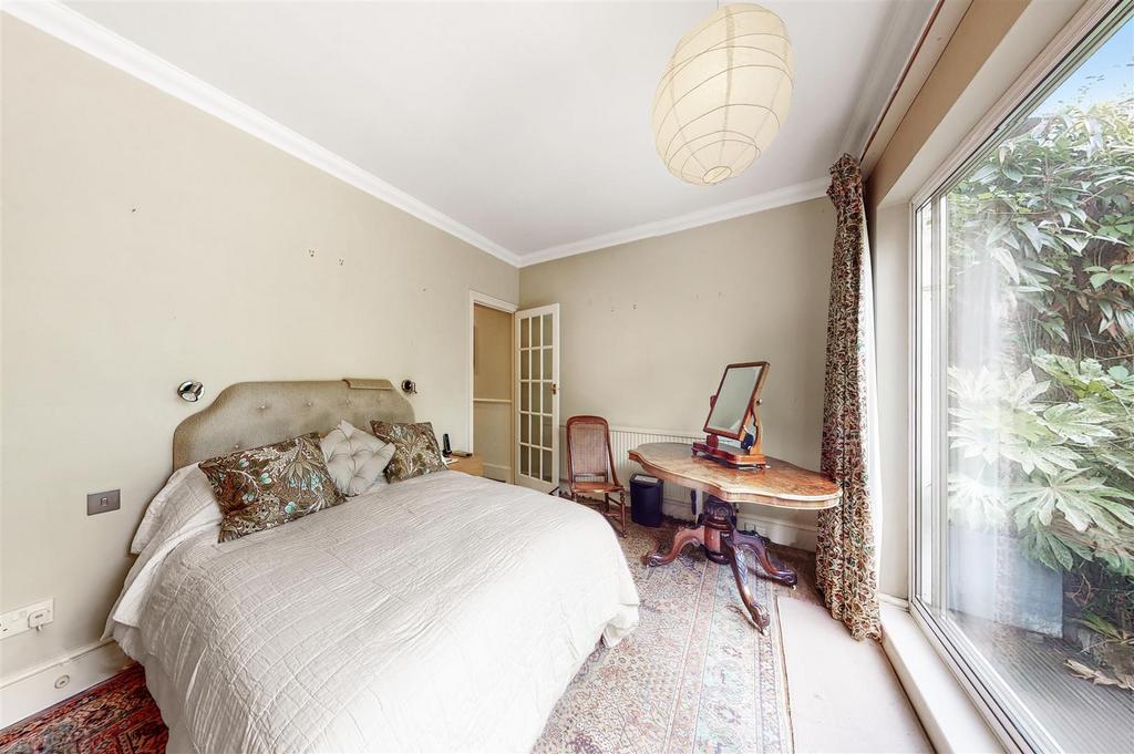 Rear room  with patio door s leading out to garden