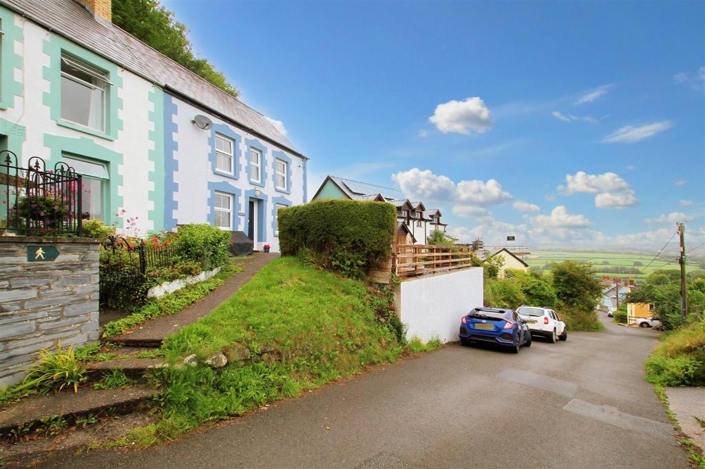 Front view with path to property