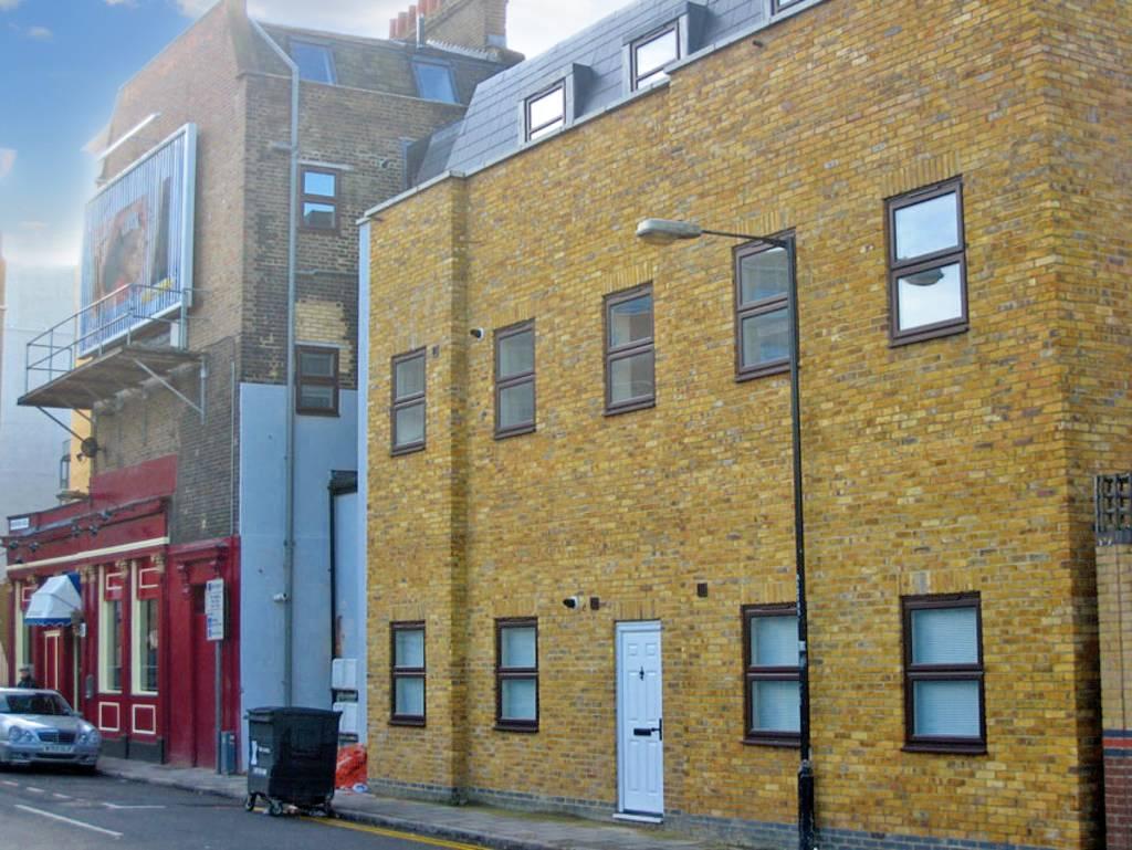 Ground Floor entrance door with four windows