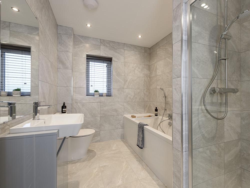 Family bathroom with a separate shower
