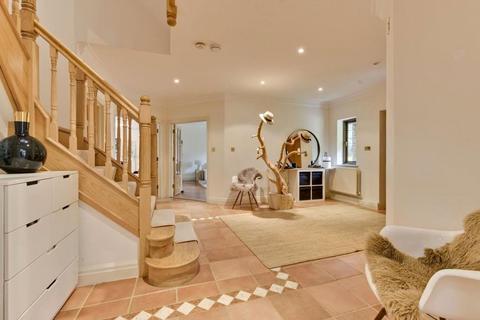 5 bedroom detached house to rent, Woodside Road, Cobham, Surrey, KT11