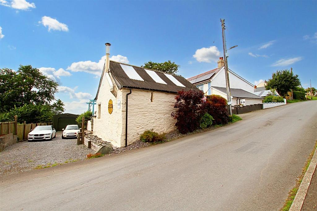 Roadside view of whole property