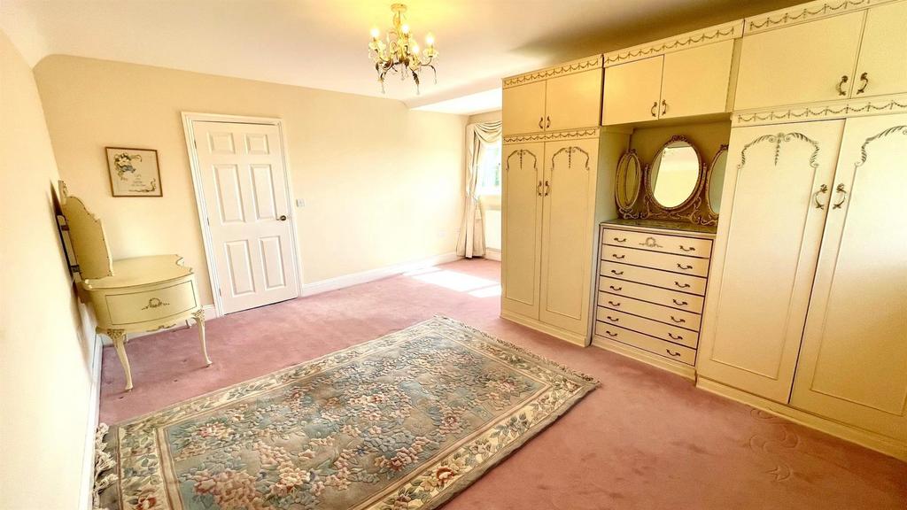 Double aspect l shaped bedroom 1