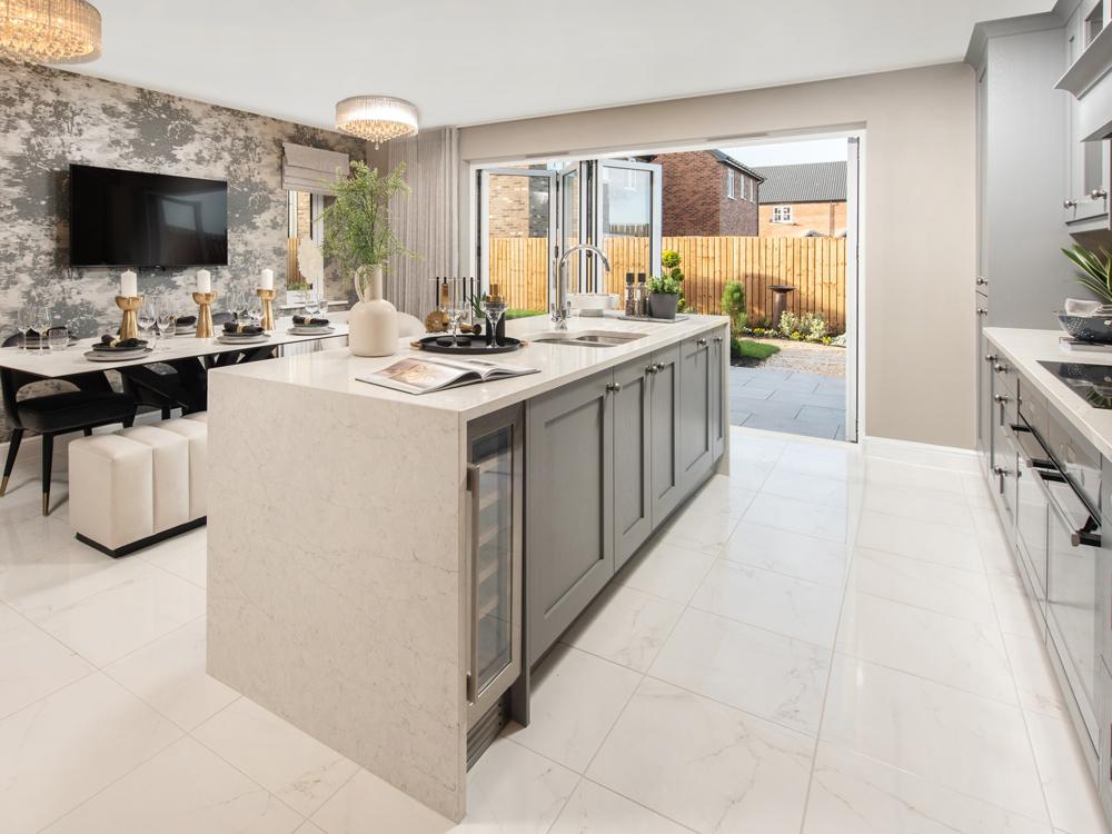 Kitchen/dining/family room with bi fold doors...