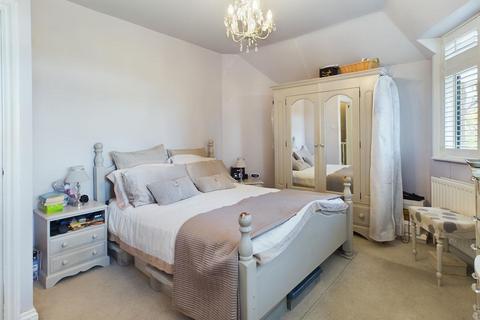 58a Lower Green Road, Esher, KT10 8HB
