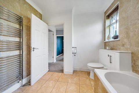 1a Aboyne Drive, London, SW20 0AN
