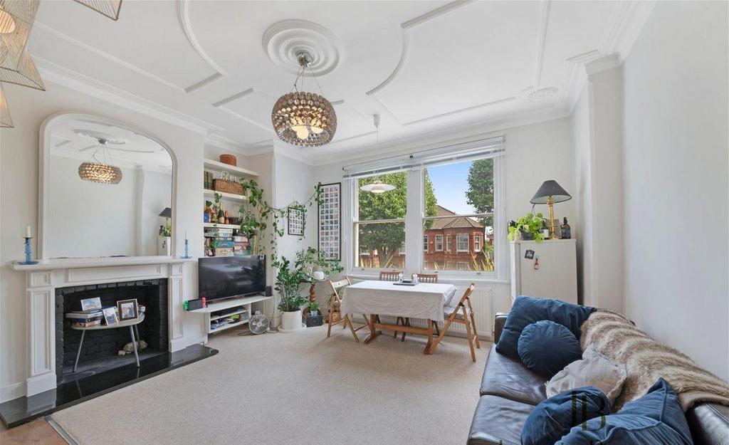 South facing reception room with high ceilings