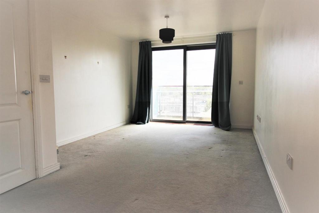 Lounge open plan to Kitchen Area