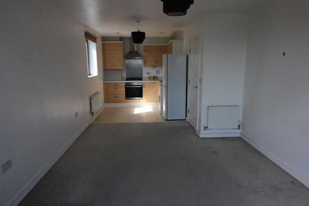 Lounge open plan to Kitchen Area