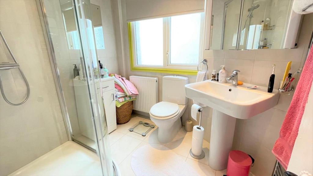 Fully tiled shower room