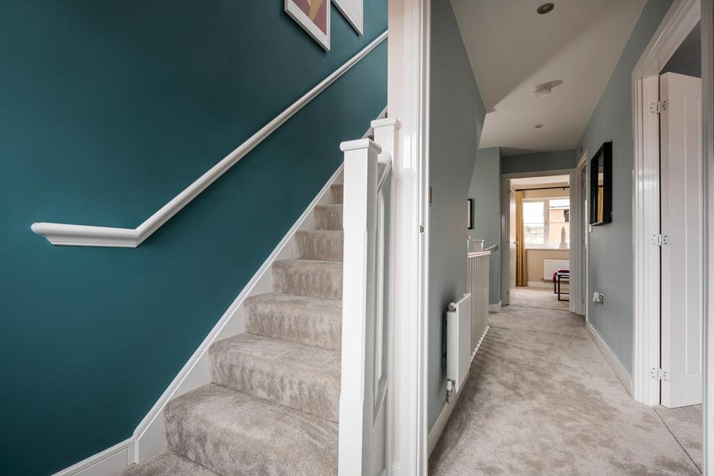 A separate entrance hallway welcomes you to the...