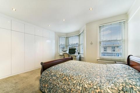 40 Quicks Road, London, SW19 1EY