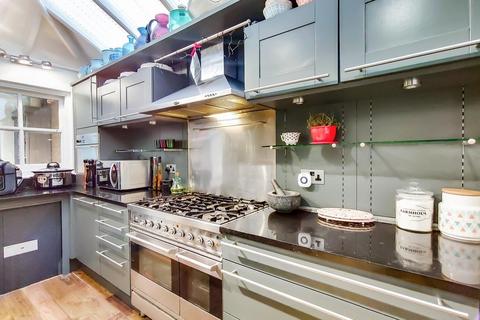 40 Quicks Road, London, SW19 1EY