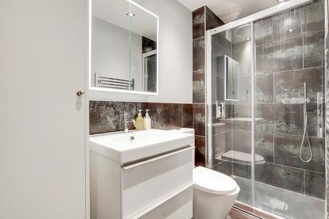 40 Quicks Road, London, SW19 1EY