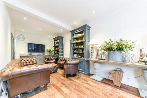 40 Quicks Road, London, SW19 1EY