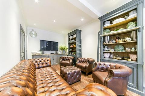 40 Quicks Road, London, SW19 1EY