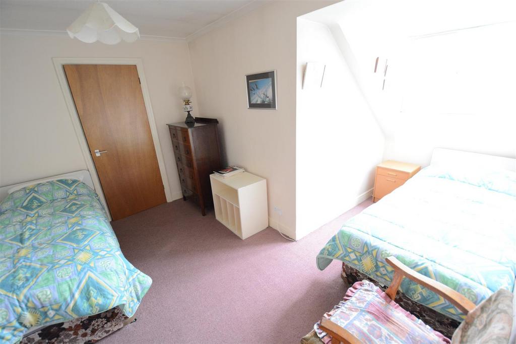L-shaped bedroom