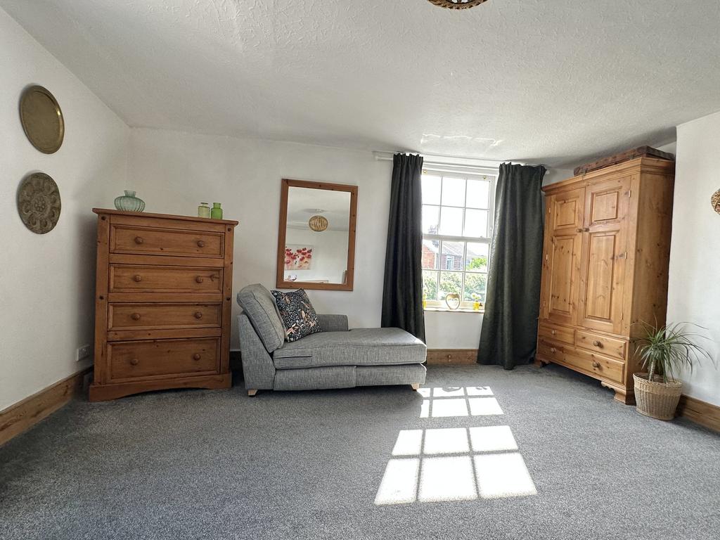 Main House Bedroom One.jpeg
