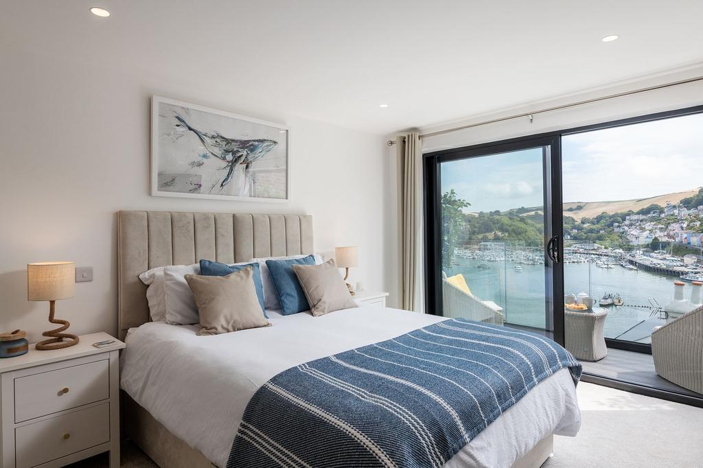 Bedroom 1 with balcony- Trafalgar Cottage Above...