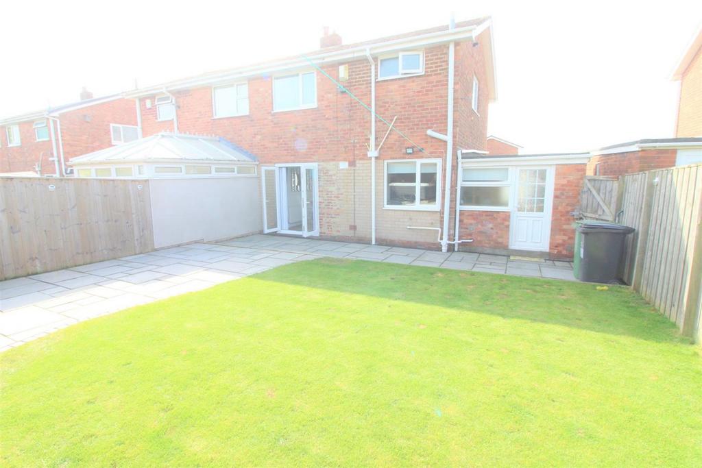 Attractive lawned rear garden