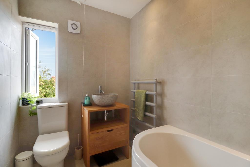 Renovated family bathroom that includes an integra