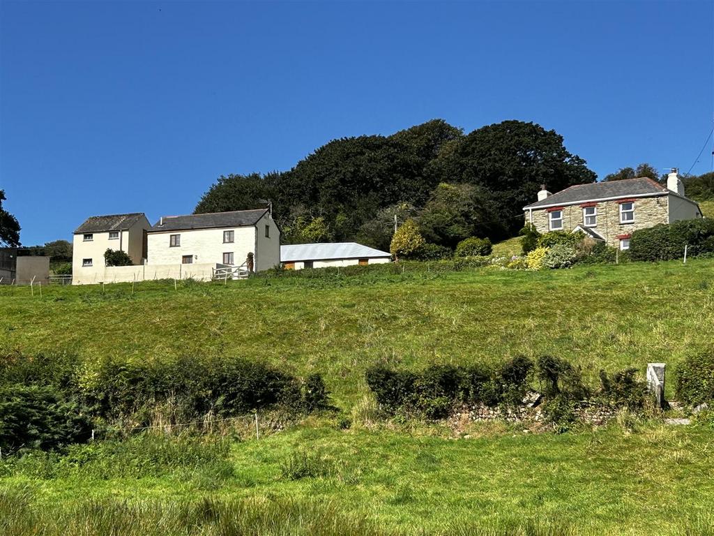 House with cottage